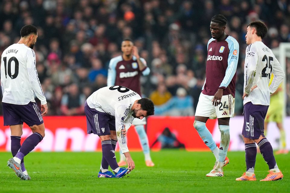Manchester United's Bruno Fernandes stretches during the Premier League match at Villa Park